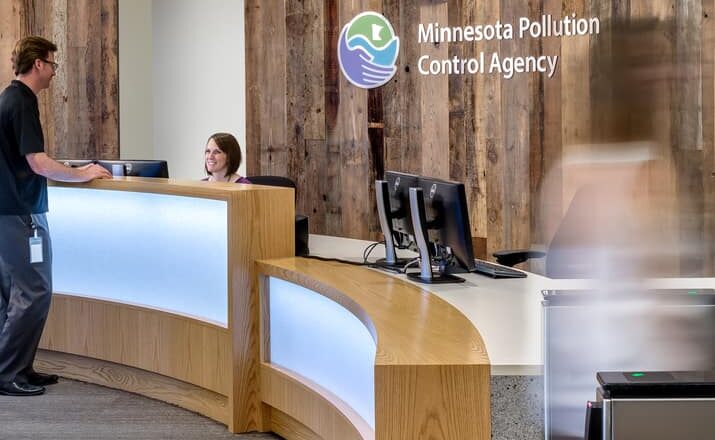 People check in at the MPCA reception desk.