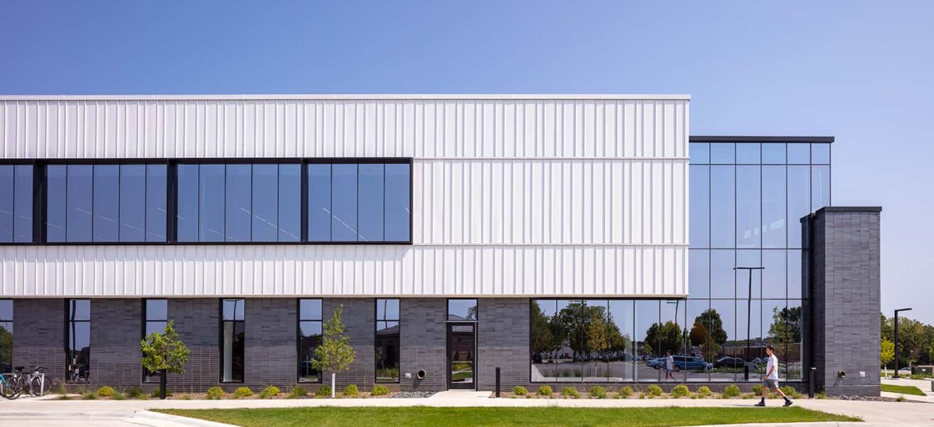 Exterior of the YMCA with white siding.