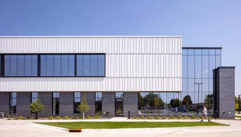 Exterior of the YMCA with white siding.