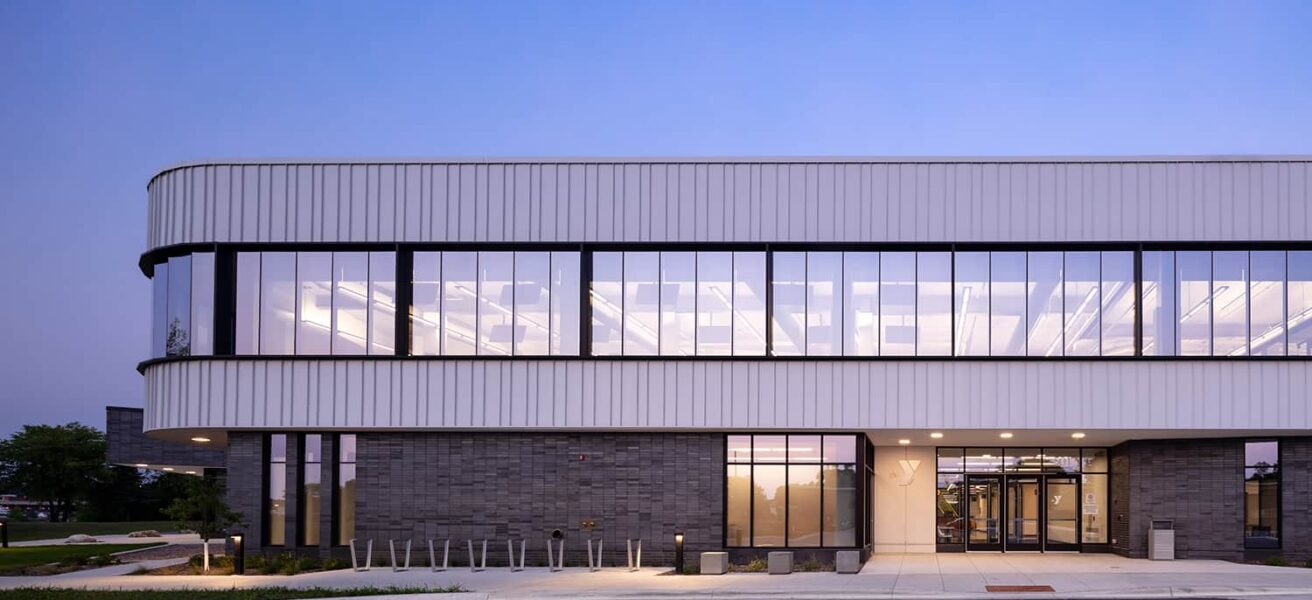 Exterior of the YMCA at dusk.