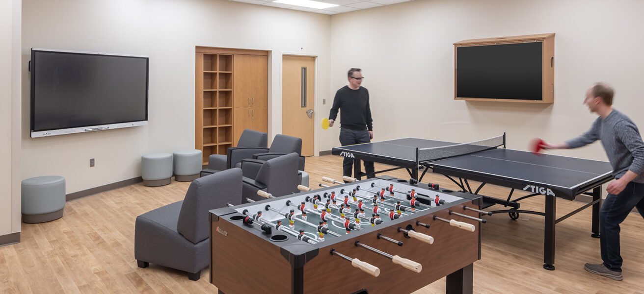 People play ping pong and foosball in a rec room at the Avera Behavioral Health Center addition
