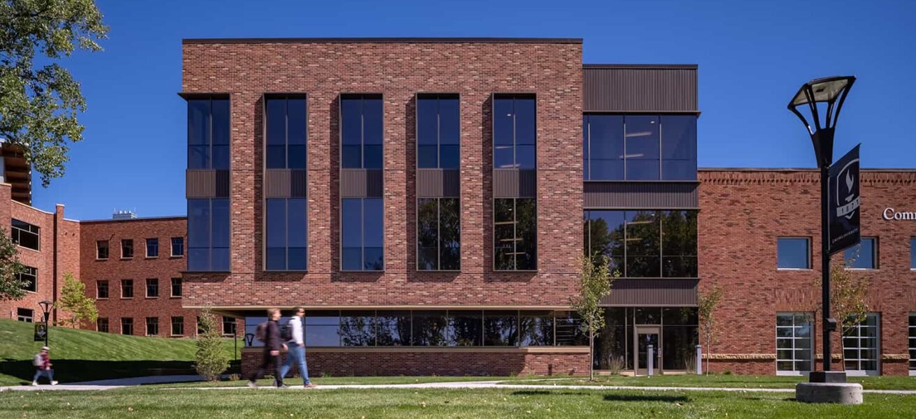 Exterior view highlighting the overall impact of the science facility addition.