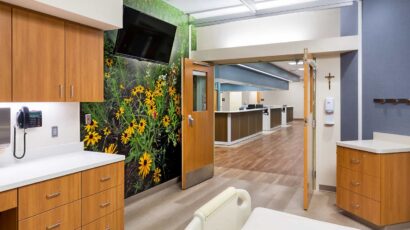 View from a burn unit patient room to the central nurses station.