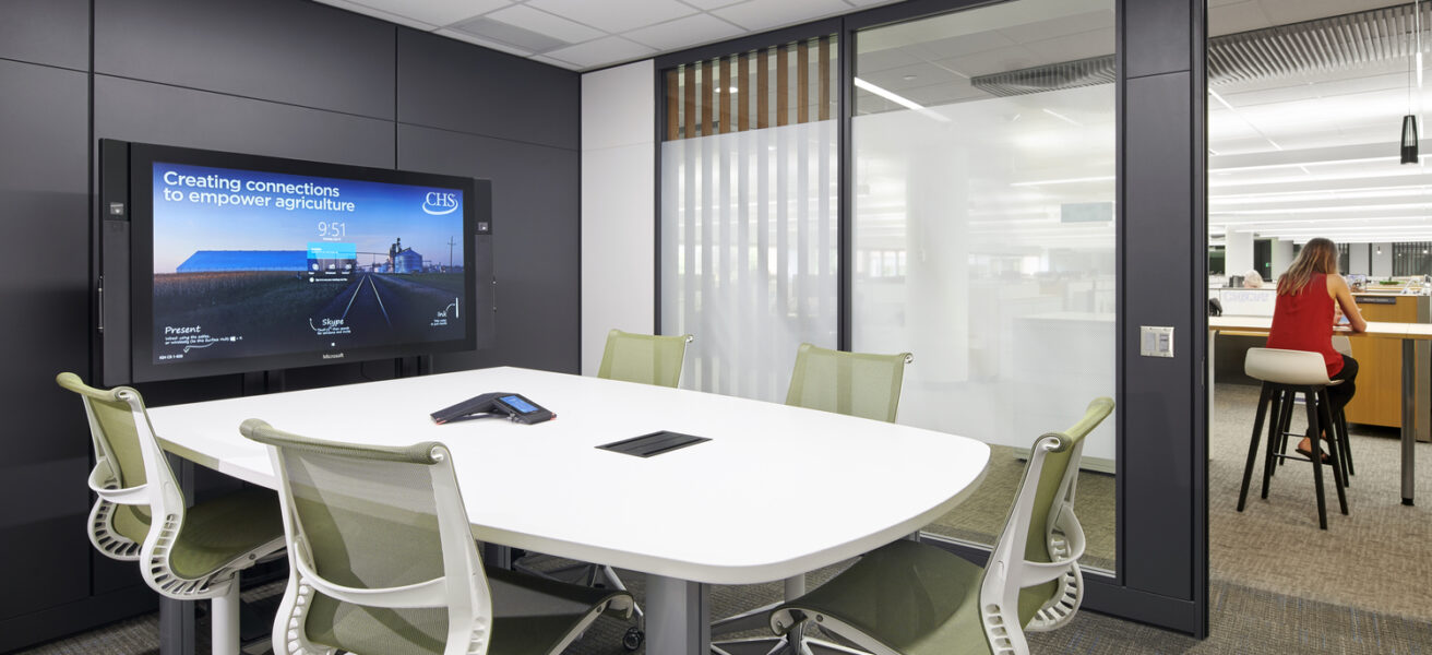 A typical CHS Inc. conference room with views to workstations.