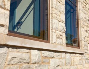 Exterior detail of the revitalized historic wood windows.