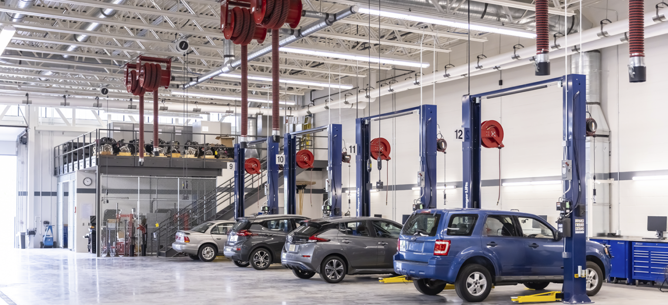 Cars are lined up in the car service garage of the Transportation Education Center.