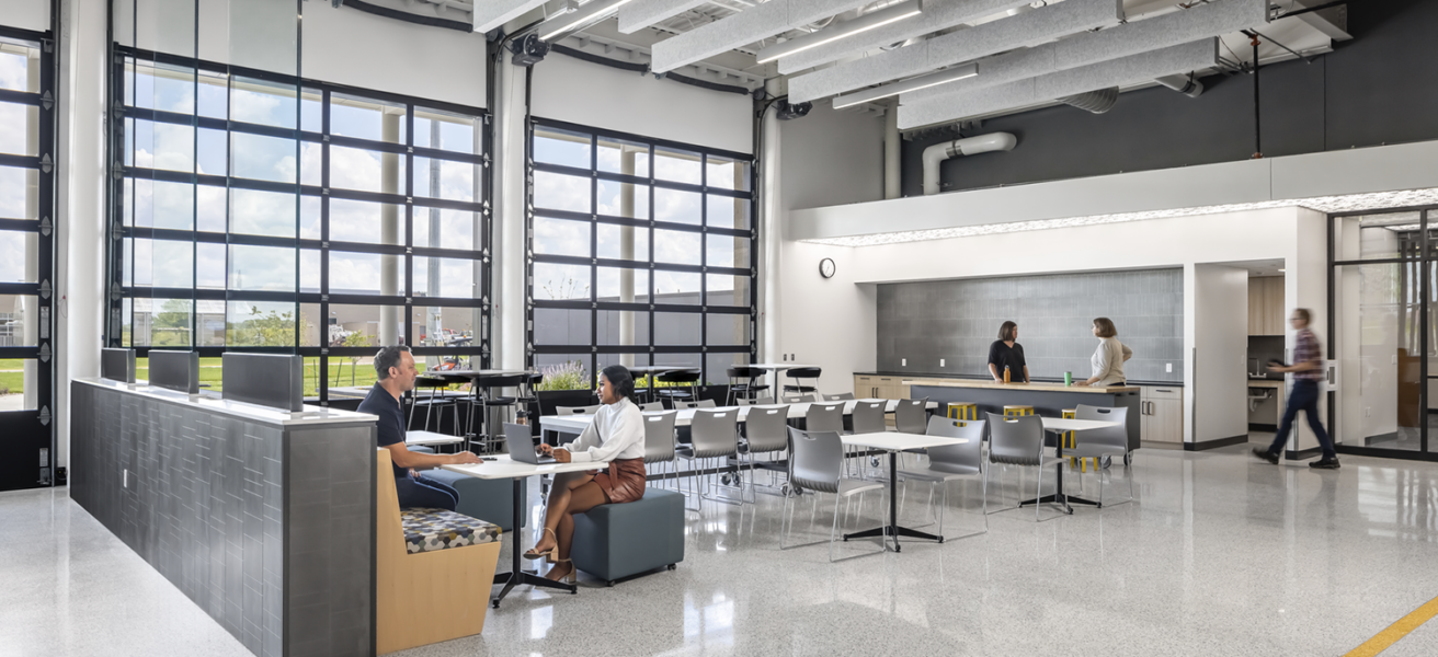 The main student lounge and collaboration space in the CVTC TEC, with glass garage doors that open the space up in nice weather.