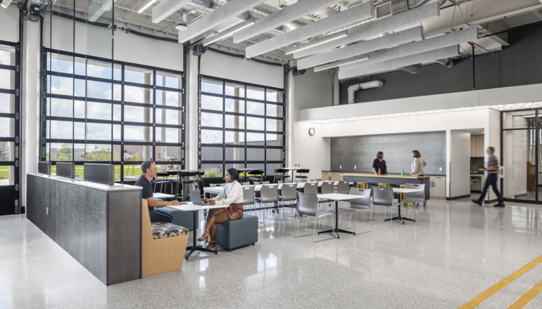 The main student lounge and collaboration space in the CVTC TEC, with glass garage doors that open the space up in nice weather.