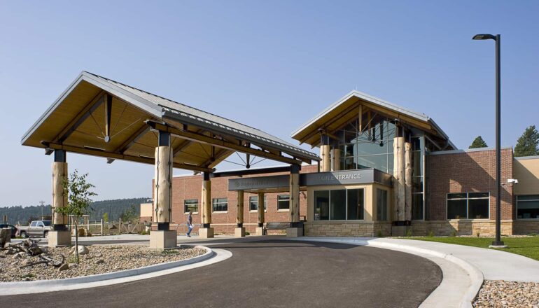 The exterior entry of the Custer Hospital in daytime