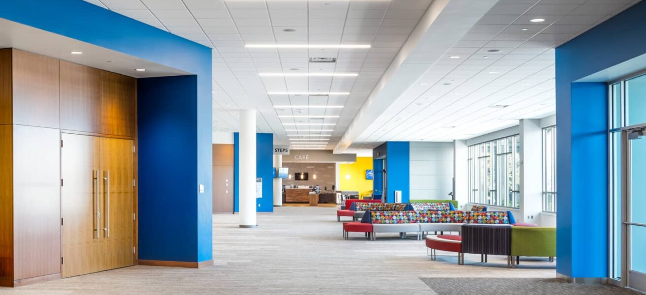 Main lobby and gathering space inside the Eagle Brook Anoka entry.