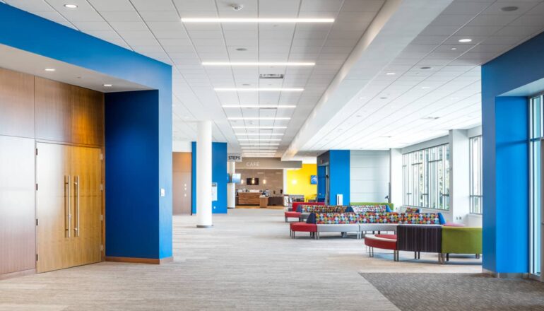 Main lobby and gathering space inside the Eagle Brook Anoka entry.