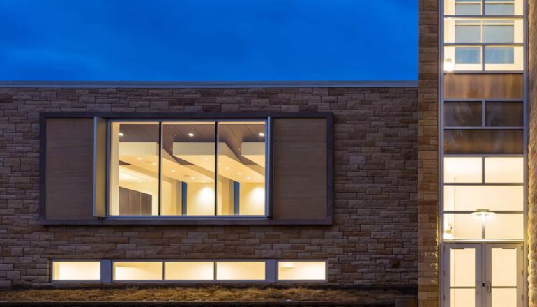 Exterior view at dusk into the multifaith worship center.