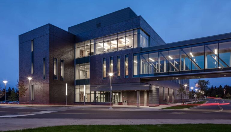 Dusk exterior view of HCAMS and connecting skyway.