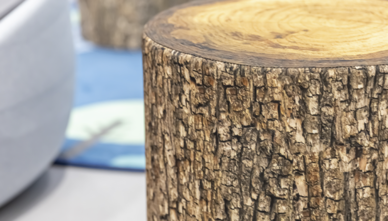 A detail shot of the stump-like children's seats in the Redleaf Center