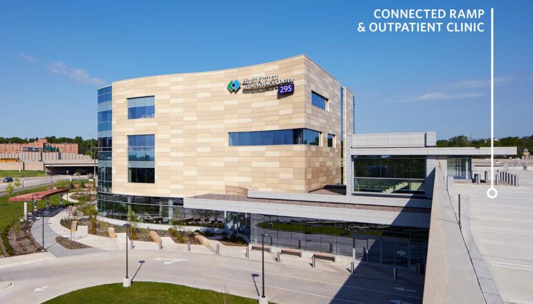 Exterior view of the Neuroscience campus, showing the connection between parking ramp and clinic.