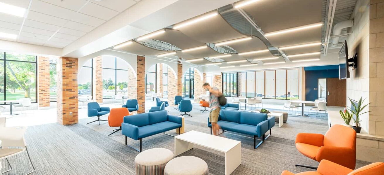 The Commons Area in the Healthcare Center of Learning with open seating options, high ceilings, abundant daylight, and access to labs and classrooms.