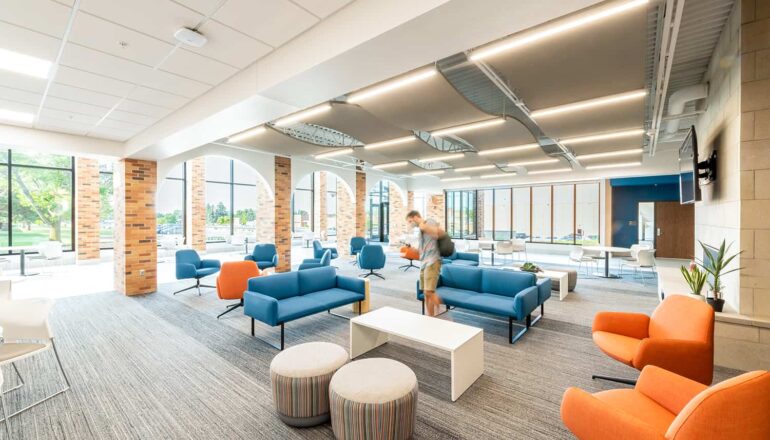 The Commons Area in the Healthcare Center of Learning with open seating options, high ceilings, abundant daylight, and access to labs and classrooms.