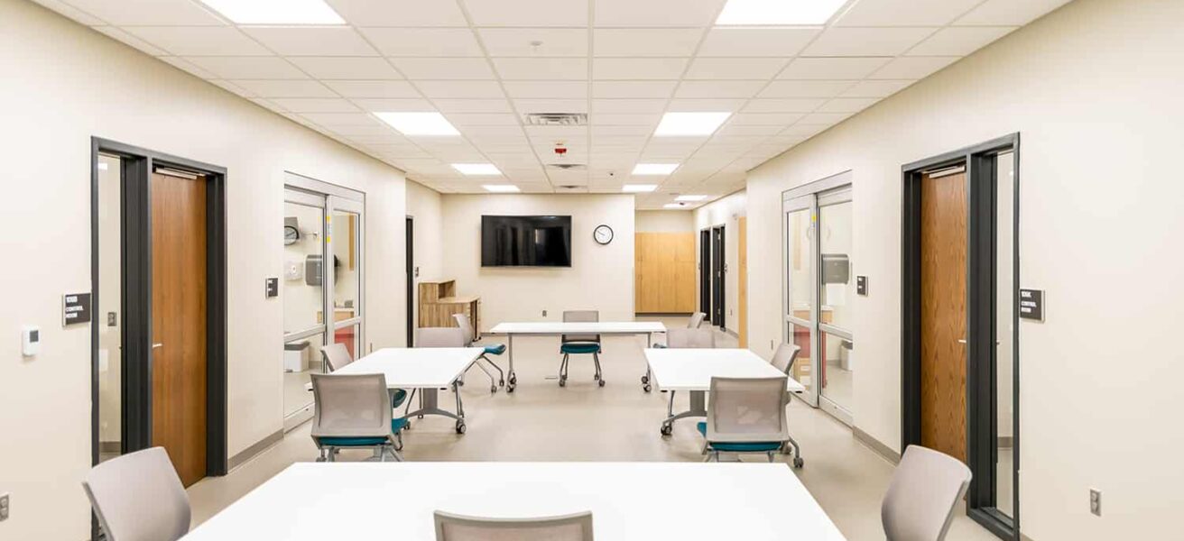 Moveable tables for active learning in a nursing classroom.