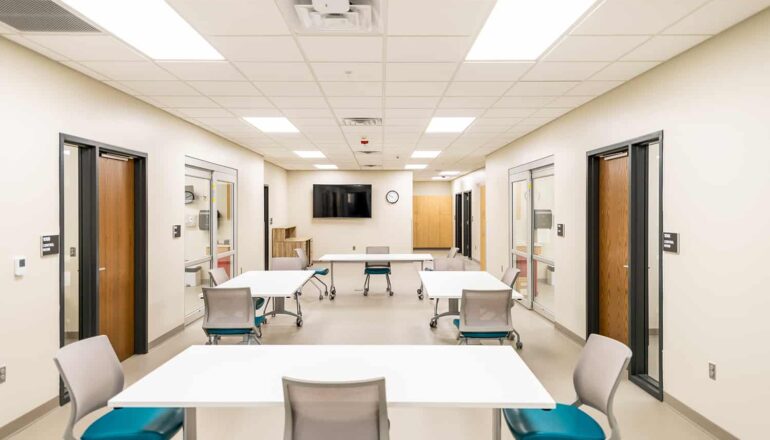 Moveable tables for active learning in a nursing classroom.