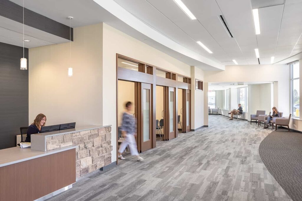 The new welcome desk offers a spacious waiting area and private check-in rooms.