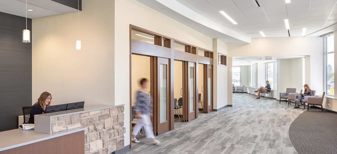 The new welcome desk offers a spacious waiting area and private check-in rooms.