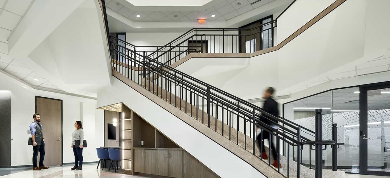 Overall view of the atrium and staircase in the office center.