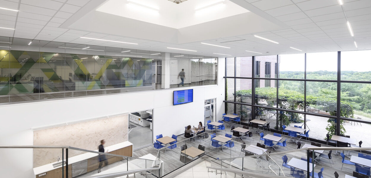 View from the top of a staircase into the Lifecore lunch and breakroom area.