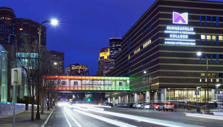 Overall exterior view of the skyway with rainbow light effect.