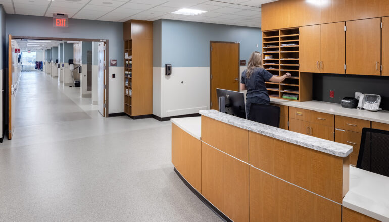 A nurse works at the HUC desk in the MMC Ashland endoscopy department