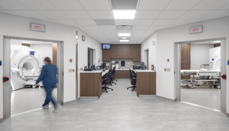 A staff member enters a diagnostic imaging room in the Mayo Clinic Health System in Mankato Imaging Center.