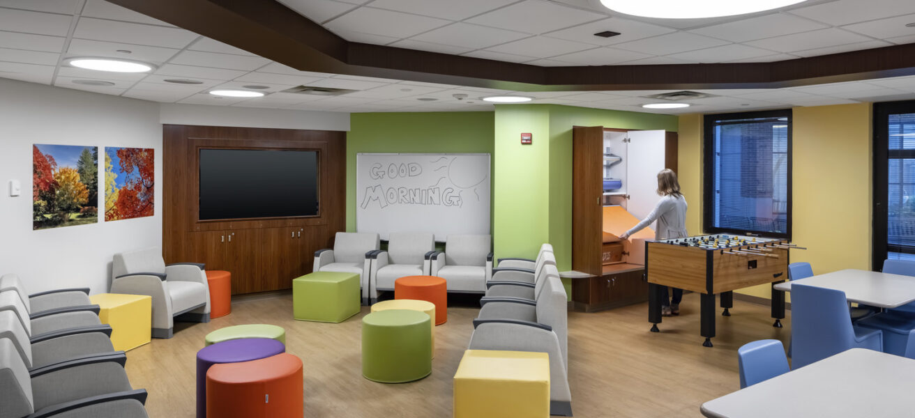 A person preps an activity in the pediatric wing of the Mayo Clinic psych department.