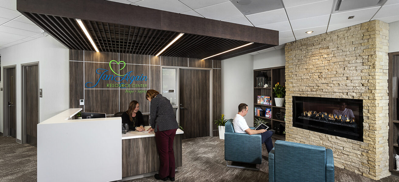 People interact at the drop-in outpatient behavioral health resources center