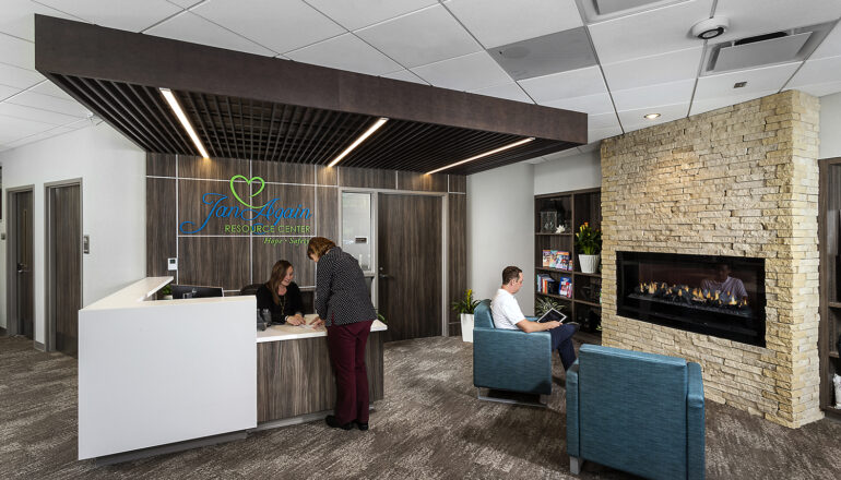 People interact at the drop-in outpatient behavioral health resources center