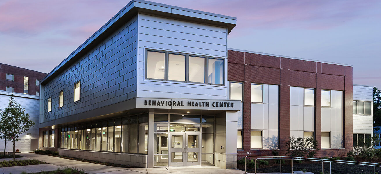 The main entry to the MercyOne North Iowa behavioral health unit at dusk