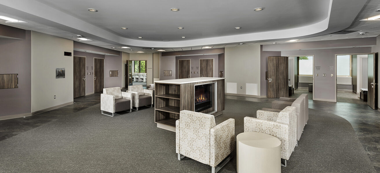 A community space with comfortable furniture in the behavioral health unit