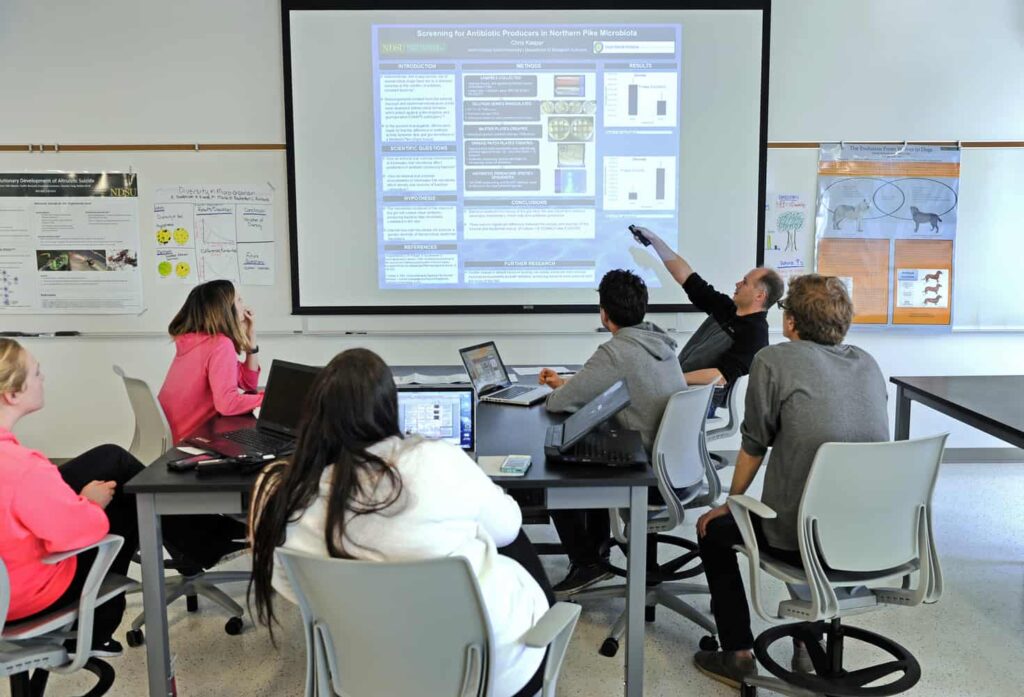 Modern classrooms combine technology with flexible seating to create an active learning environment.