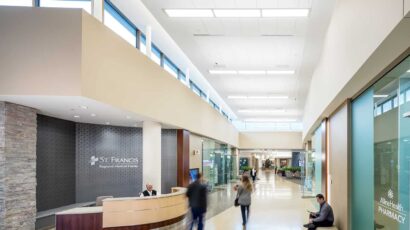 The main corridor of the new lobby, with a help desk and access to retail shops and the pharmacy.