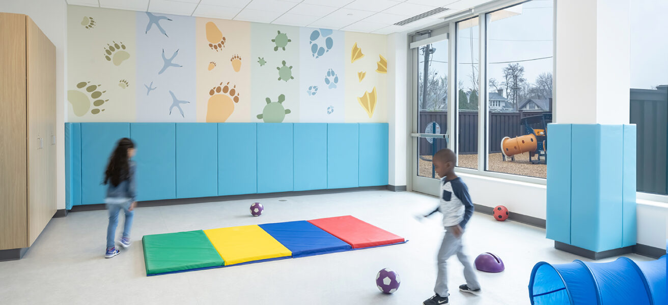 Children playing in the secure indoor play gym.