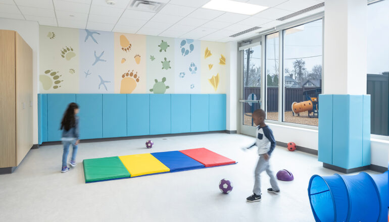 Children playing in the secure indoor play gym.