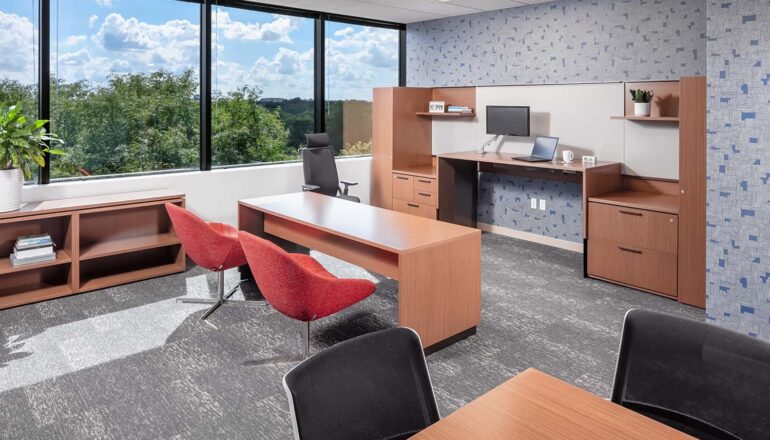 Private office with expansive window views and options for touchdown seating.