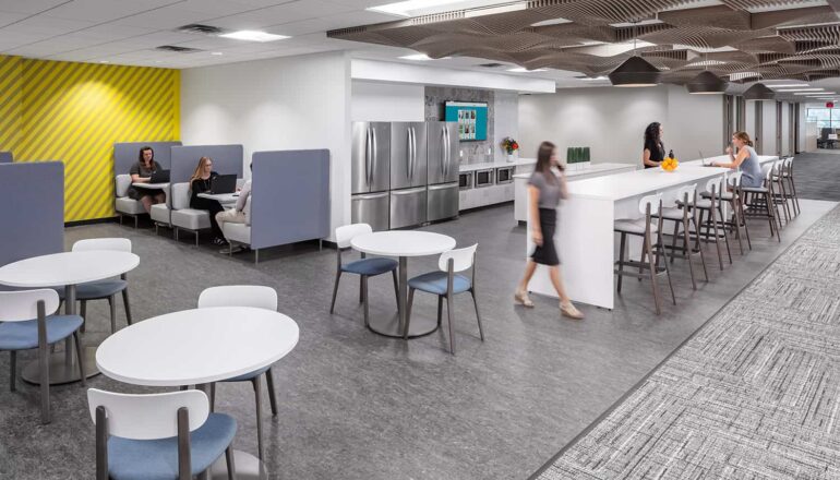 Work cafe with booths for focused conversations and open touchdown seating.