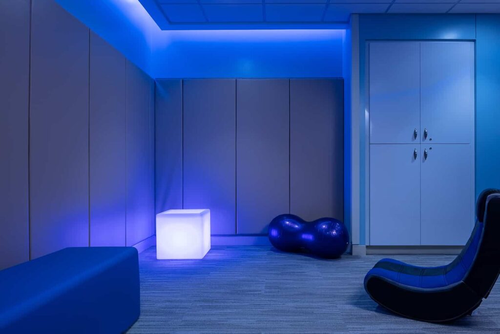 Sensory room with blue lighting.