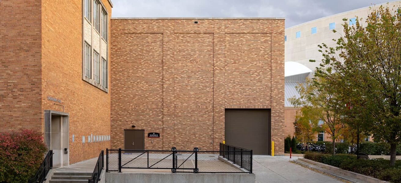 Exterior view of the lab entry and materials loading dock door.