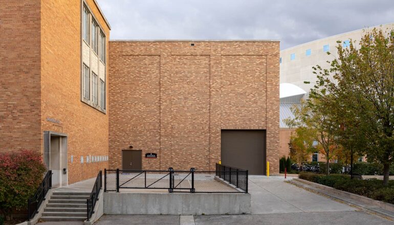Exterior view of the lab entry and materials loading dock door.