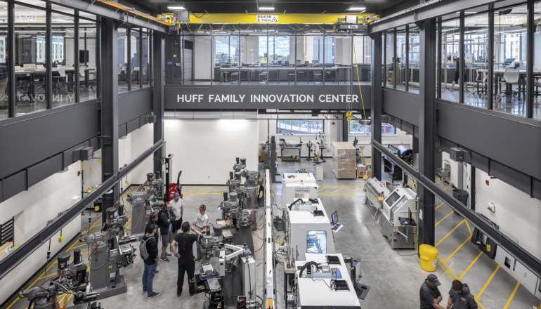 Students learn in the hands-on Innovation Center hub with plenty of robotics equipment.