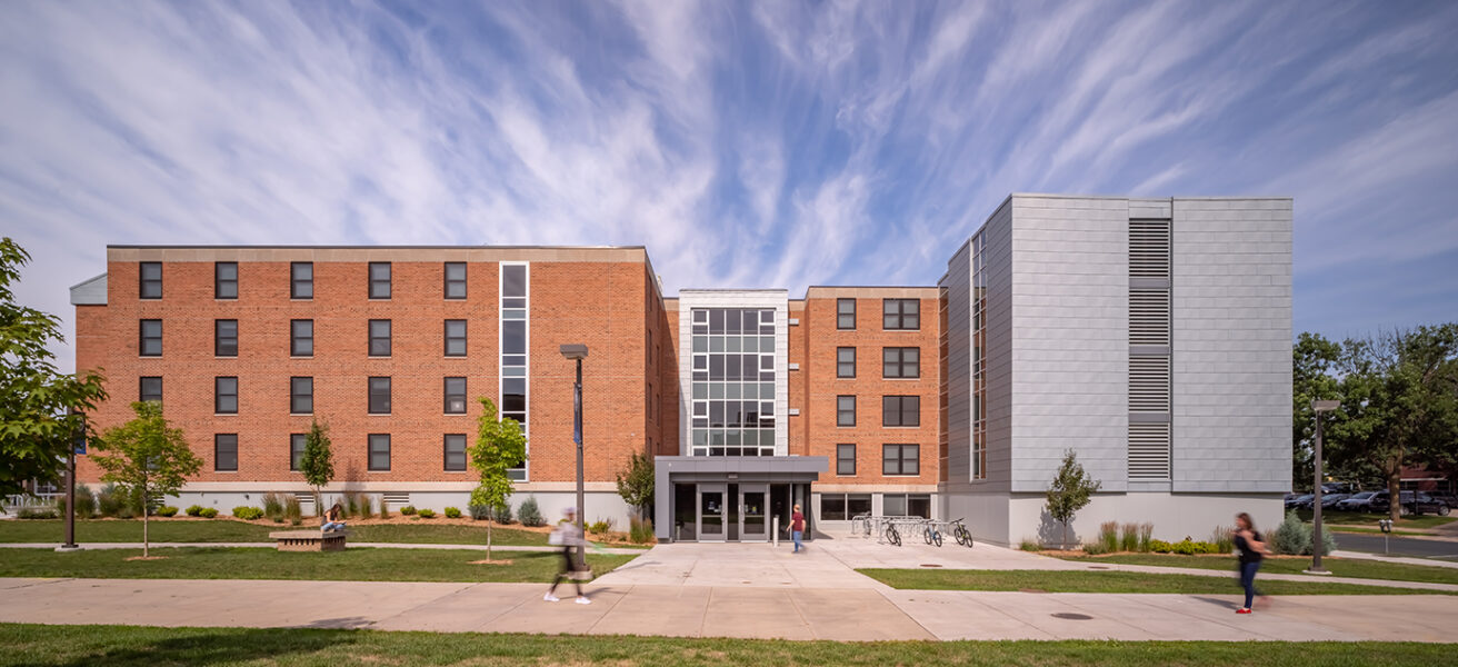 Head-on exterior view of the main North Residence Hall entry and overall building