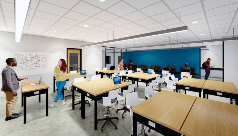 A senior design lab classroom with moveable furniture and a teal accent wall.